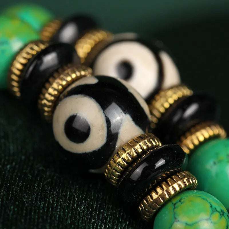 Natural turquoise bracelet with 108 polished 8mm round beads on white background