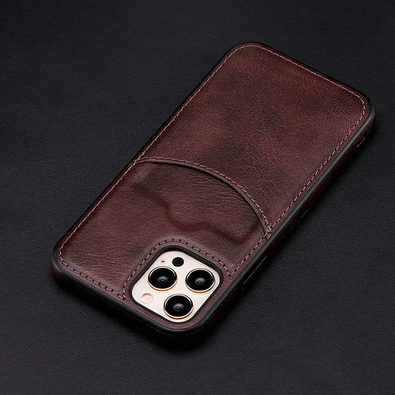 Dark blue PU leather snap-on case for iPhone showing precise cutouts for camera and ports.