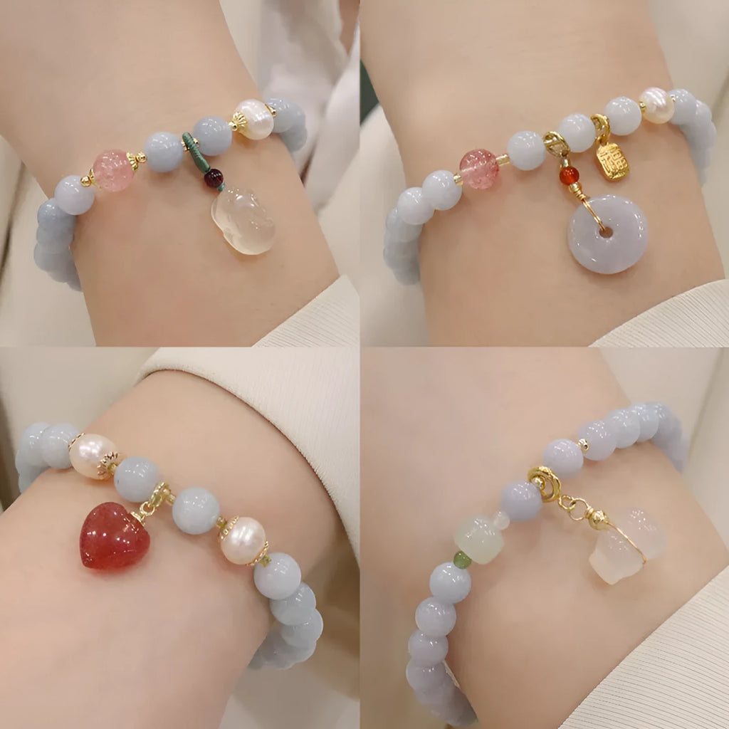 Women's gold-plated bracelet with artificial crystal and chalcedony pendant in climbing cat design