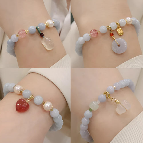 Women's gold-plated bracelet with artificial crystal and chalcedony pendant in climbing cat design