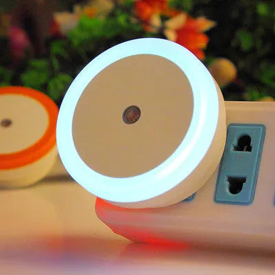 Round halo shaped LED induction nightlight with motion sensor in blue, red, white, and yellow colour options.