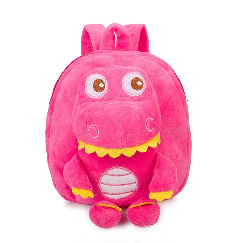 Soft blue plush children's backpack with an embroidered dinosaur character and a soft handle.