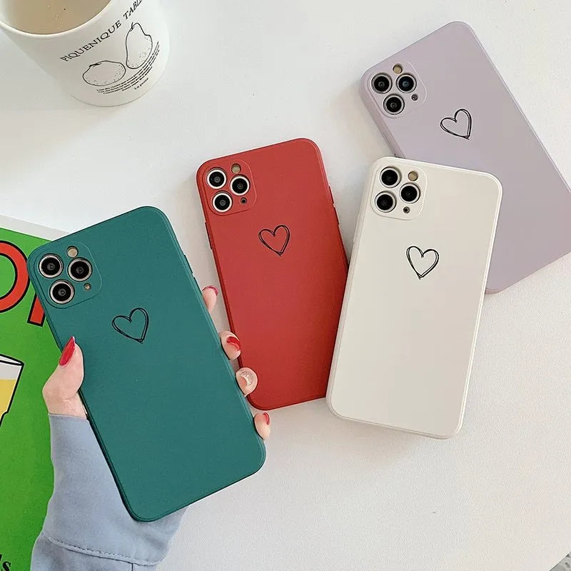 Silicone TPU phone case for Apple iPhone in various solid colours on a white background.