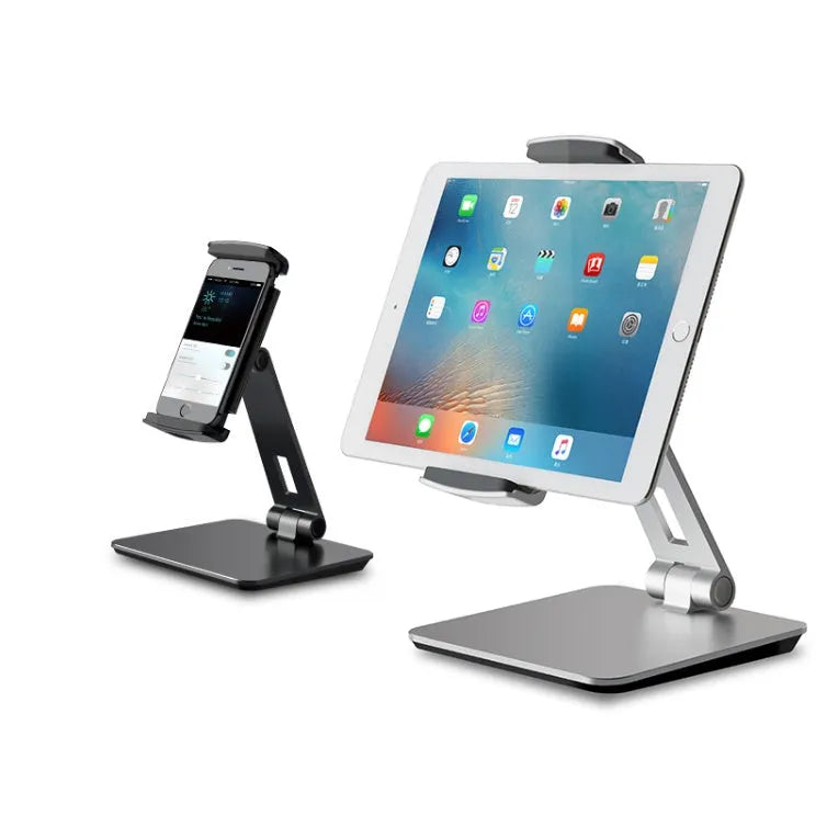Silver foldable aluminium phone tablet holder on desk showing 360° rotation