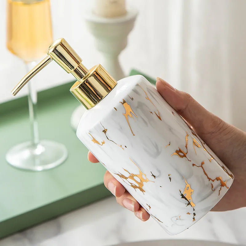 White ceramic bathroom wash kit with cup, soap box, and latex bottle