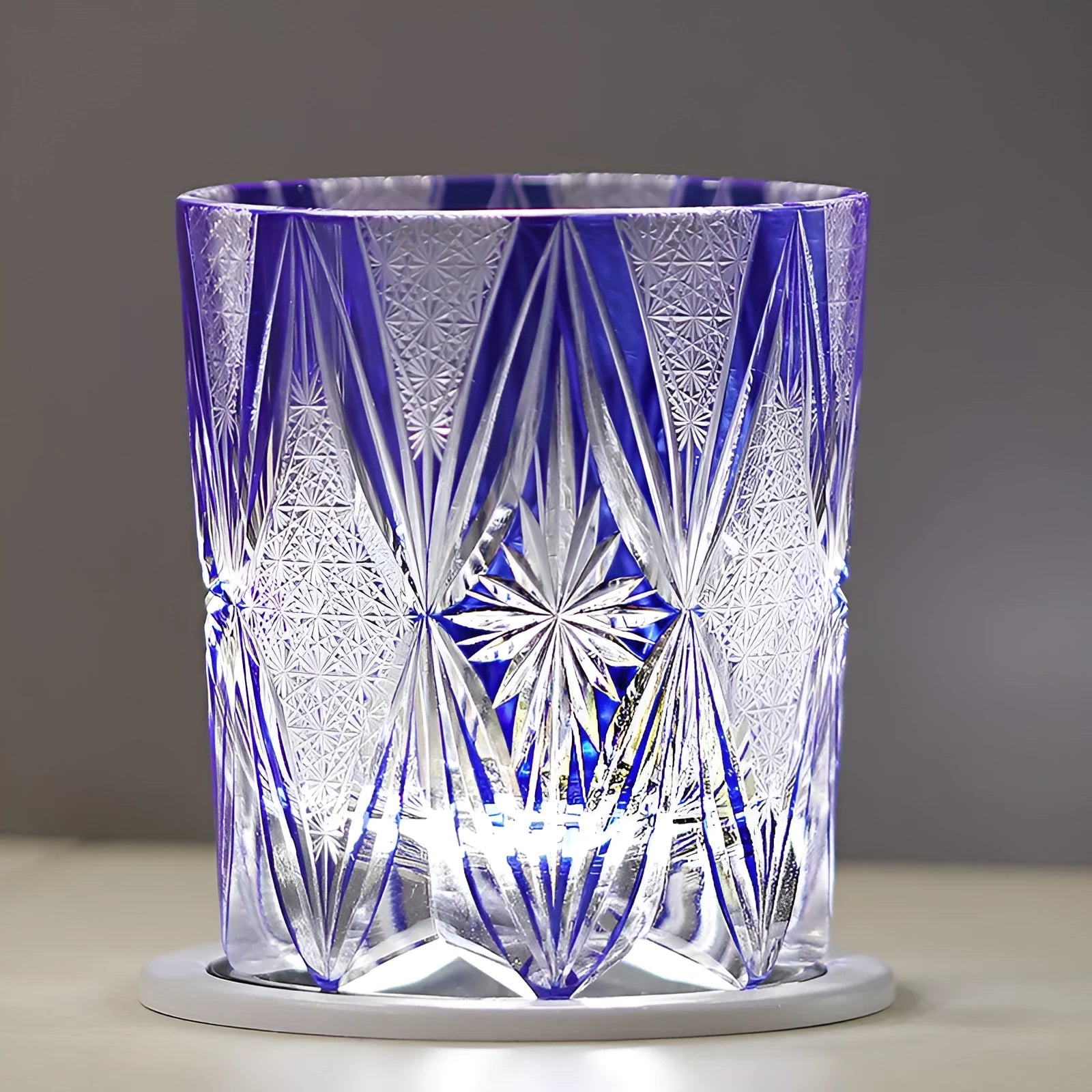 Blue hand carved crystal wine glass with 260ml capacity, retro Japanese style, on a table