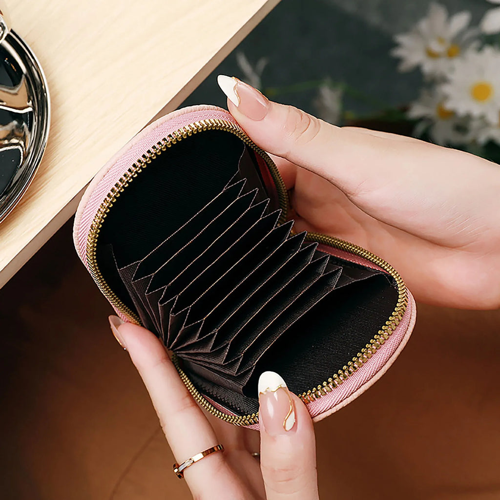Lychee pattern penguin expanding card holder in black PU leather with rivet details 12x7.5x3cm