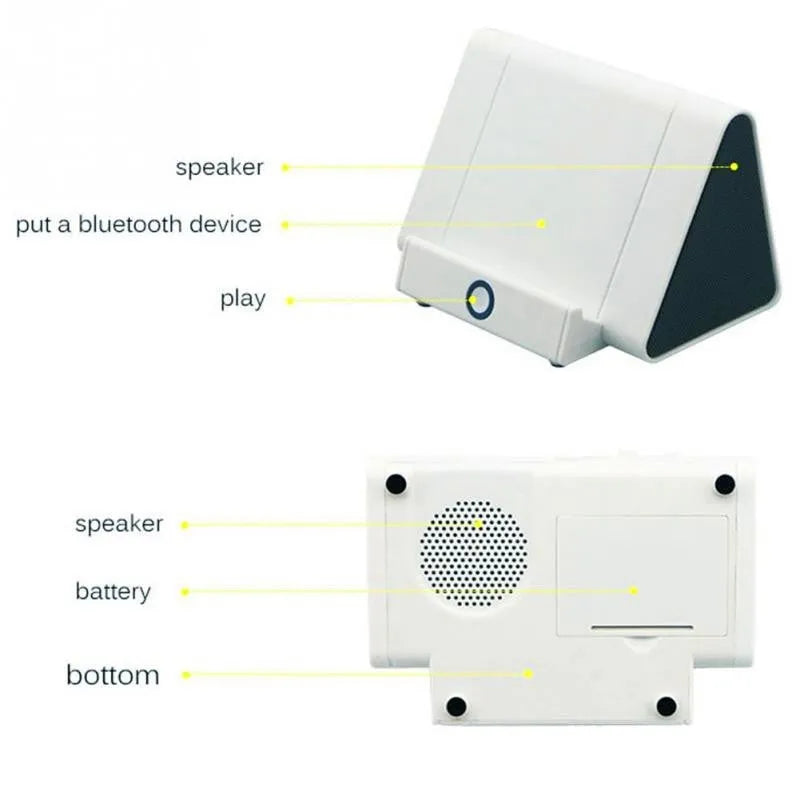 Black and white wireless Bluetooth mini speaker with charging cable