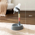 Green adjustable standing water dispenser for pets with detachable pole and ball-tip nozzle on a stable base.