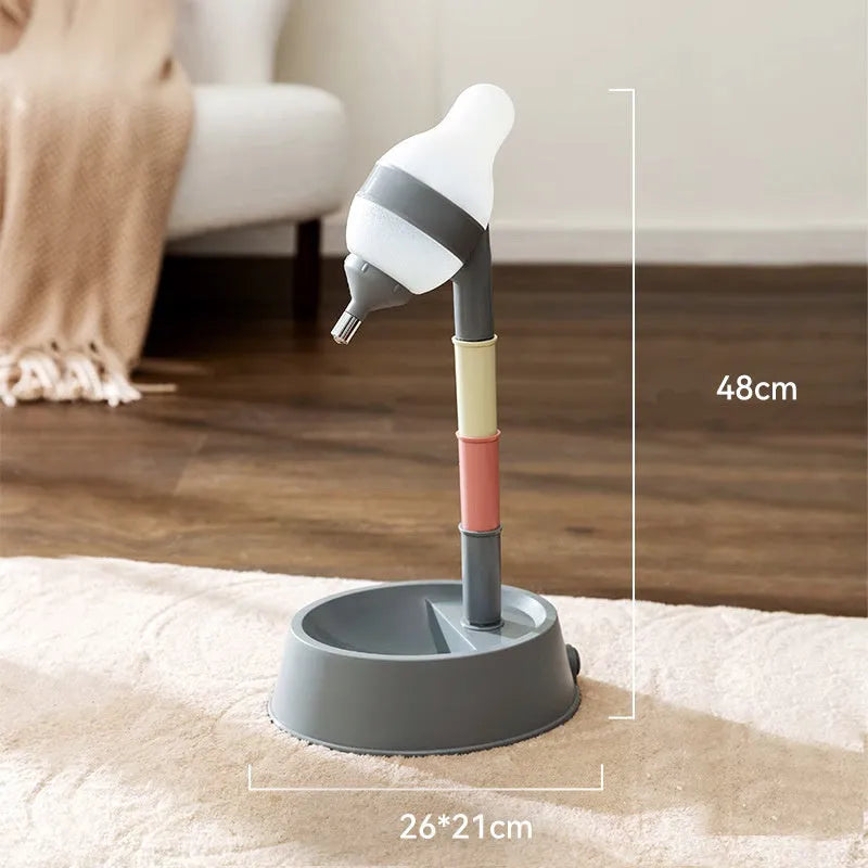 Green adjustable standing water dispenser for pets with detachable pole and ball-tip nozzle on a stable base.