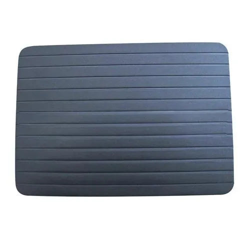 Black aluminium kitchen defrosting tray for thawing frozen meat and food without electricity