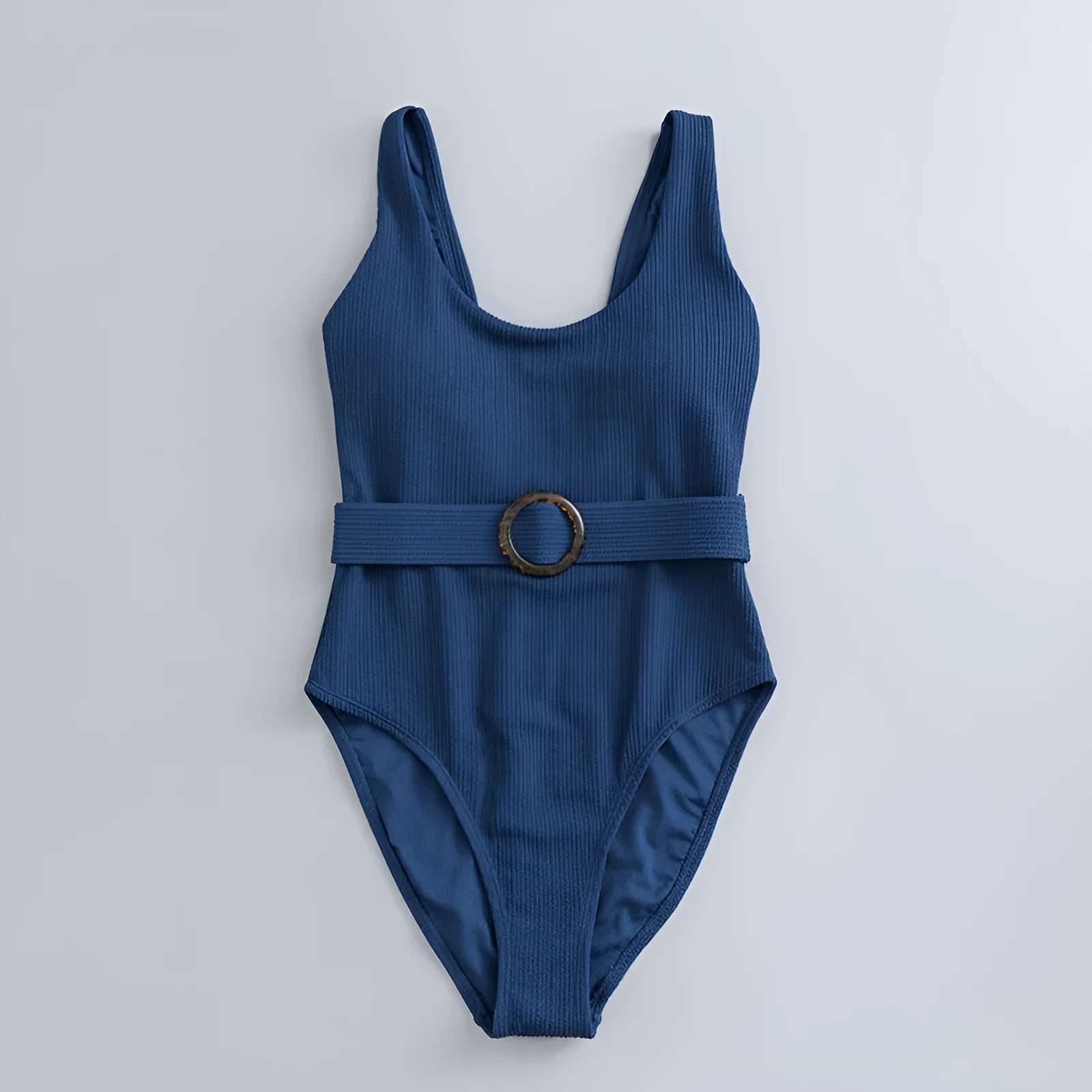 Navy blue women's slim-fitting one-piece triangle swimsuit on a mannequin.