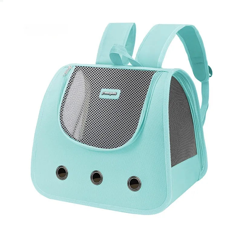 Solid-colour Oxford fabric cat backpack carrier in a medium size on a white background.
