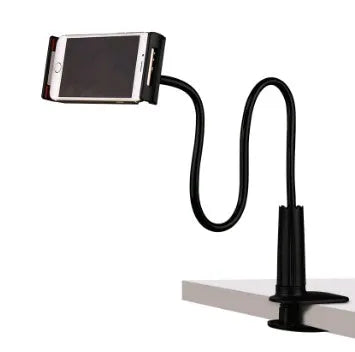 Black bedside phone handset with long adjustable arm and clamp base on a wooden table.