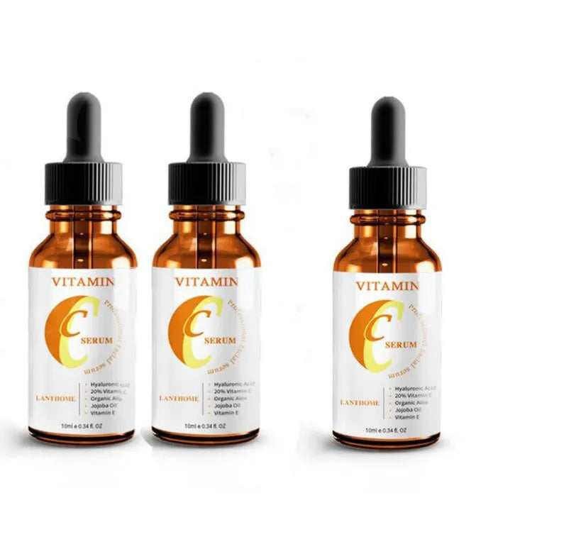 Bottle of Vitamin C and hyaluronic acid facial serum for skin brightening and anti-aging.