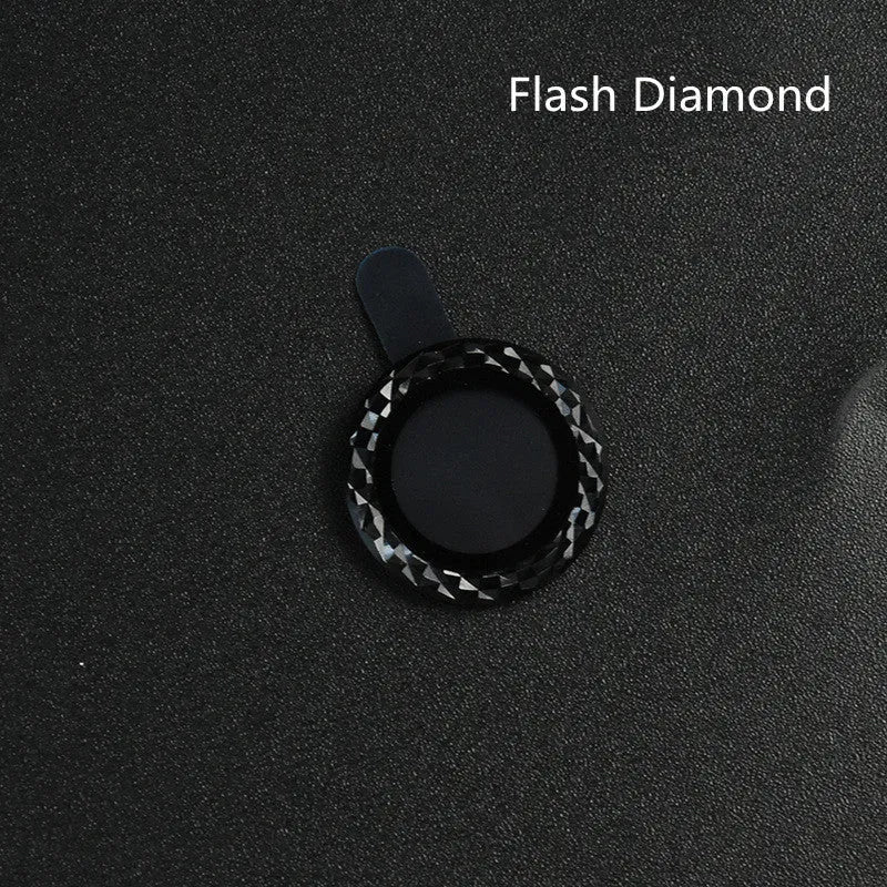Close-up of a diamond lens protective film with aluminium ring for iPhone 12 Pro Max in silver.