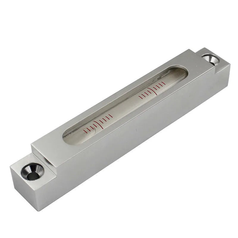 Small metal and glass mini strip spirit level with bubble vial.