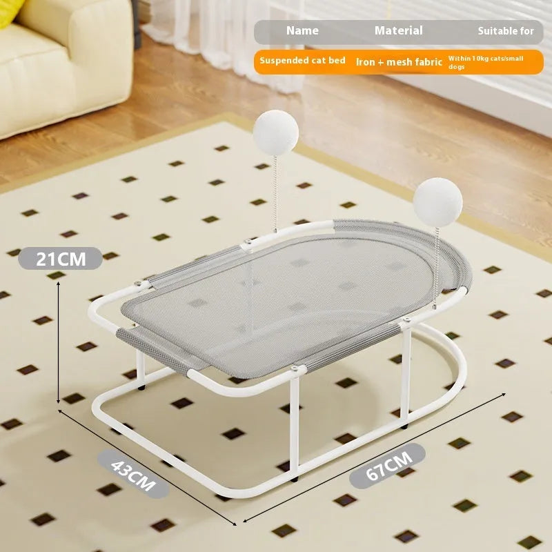 Grey metal frame cat kennel with a soft breathable fabric bed elevated off the floor.