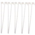 Pack of ten white plastic car window flagpole holder clips on a car window.