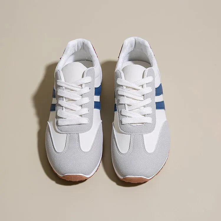 Blue and grey striped Cortez-style casual shoes with round toe and flat rubber sole