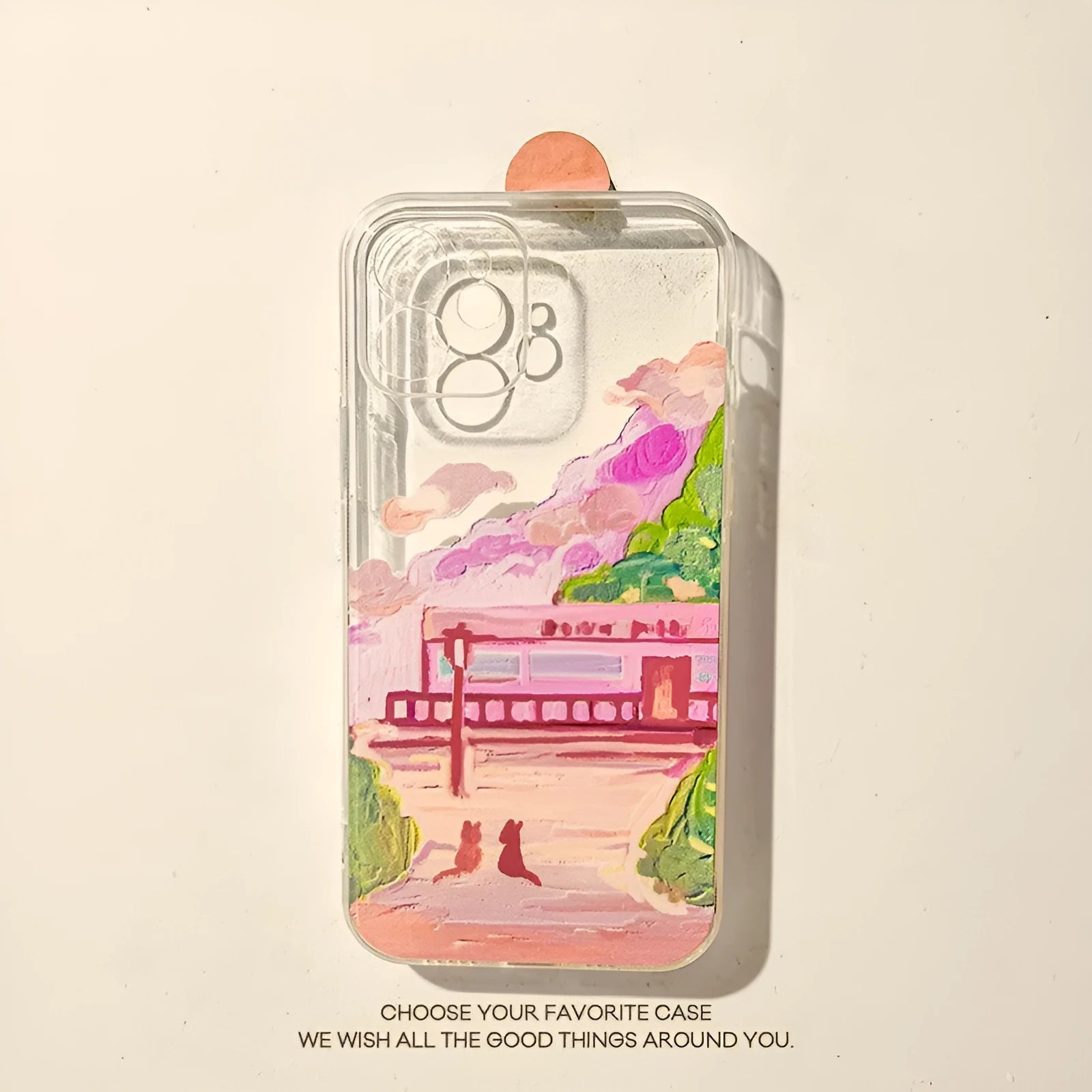 Soft silicone iPhone case with a colour-painted two cat cartoon design on the back.