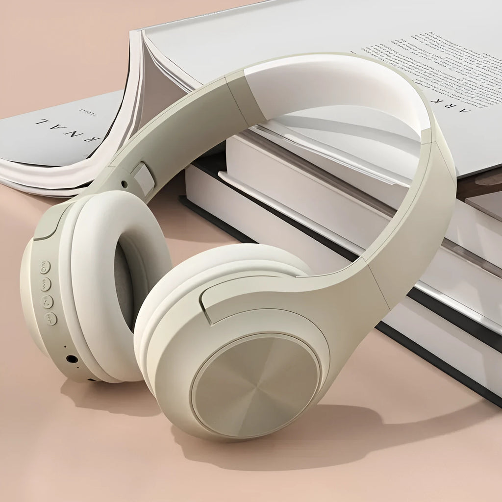 Wireless Bluetooth headset with head-mounted design in Youth Green colour, shown with its charging case.