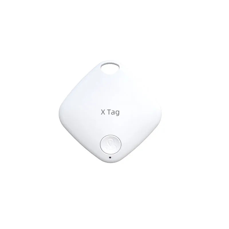 Small black Bluetooth key finder tracker on a keyring next to a smartphone showing location app.