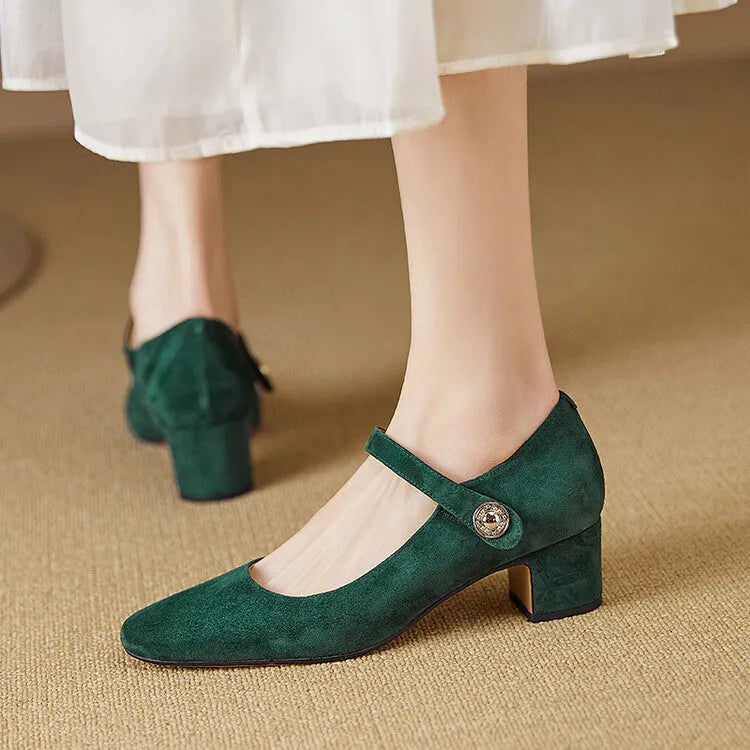 Women's black suede Mary Jane shoes with a chunky heel and square toe on a white background