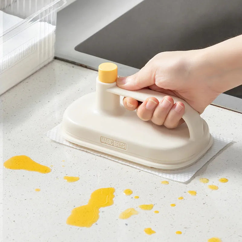Magic Brush cleaning tool with disposable rag refills for multi-surface household cleaning