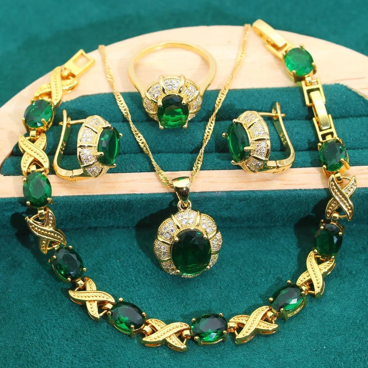 18k gold-plated necklace, earrings, ring, and bracelet set with colourful Raytheon-cut cubic zirconia stones.