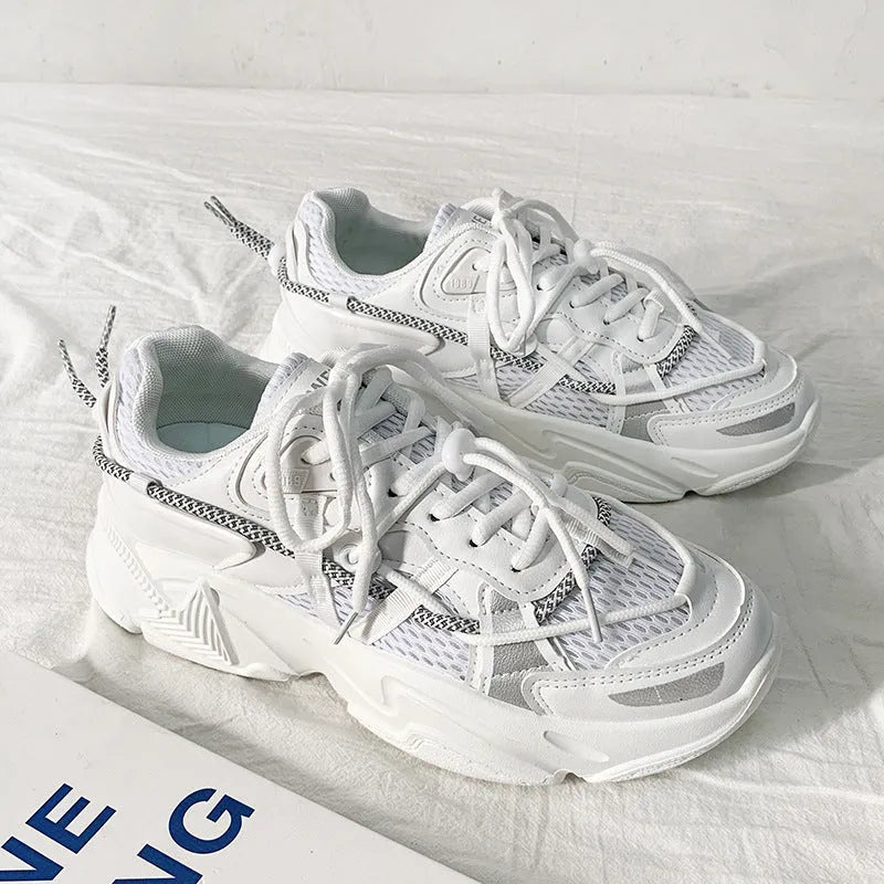 Men's white Korean-style platform dad sneakers with lace-up front and breathable mesh lining.