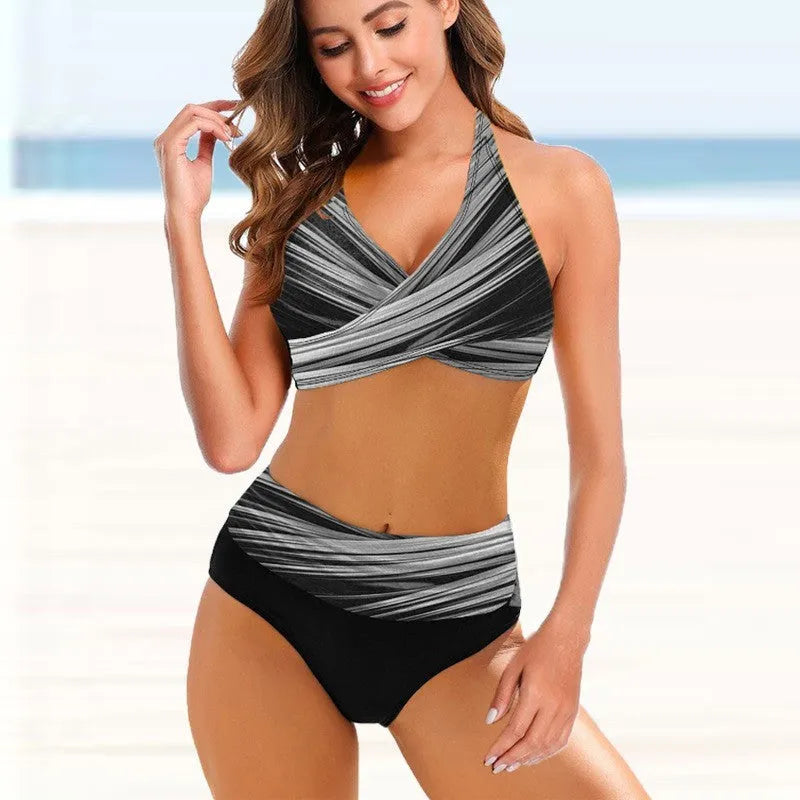 Ladies striped tie-dye hollow bikini set in high-waisted briefs style on a mannequin.