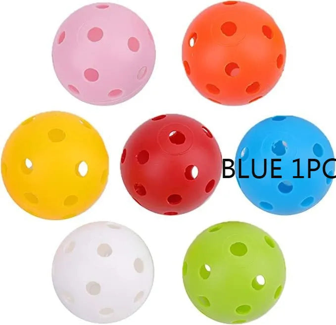 Multi-colour golf practice balls in red, orange, blue, green, white, and yellow shown in a net bag.