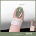 Bottle of micro glass bead cat's eye gel nail polish showing a range of 15 colour options