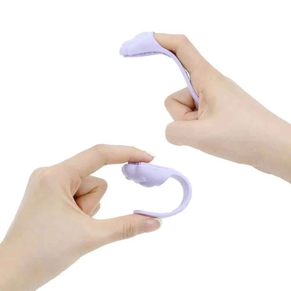 Silicone finger toothbrush for pets in pink, purple, and yellow colours