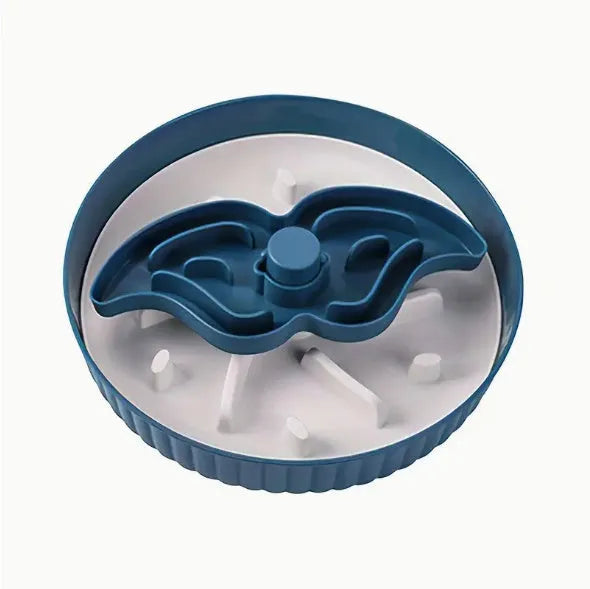 Grey slow feed dog bowl with rotating puzzle disc and a textured, green silicone licking mat in the centre