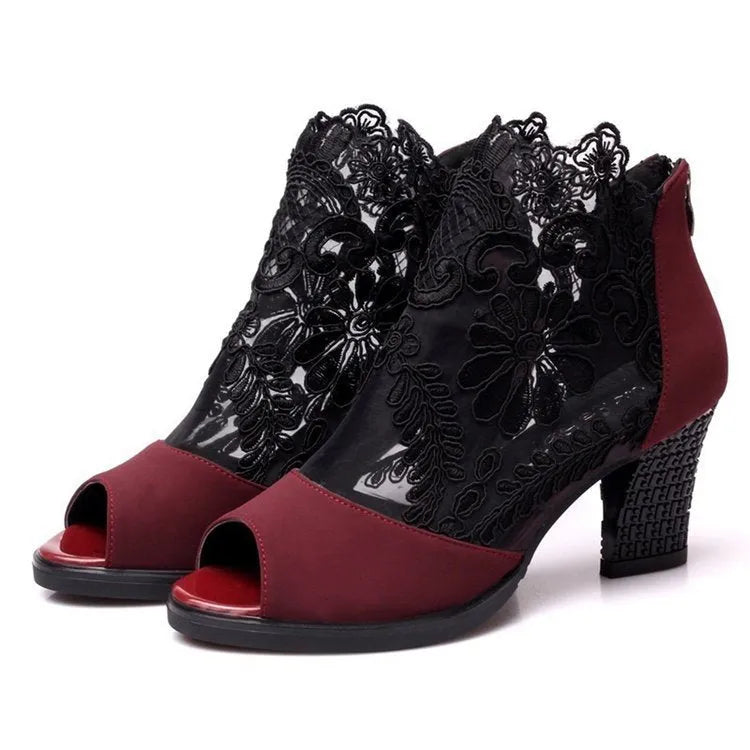 Black lace women's gladiator sandals with a square high heel and peep toe.