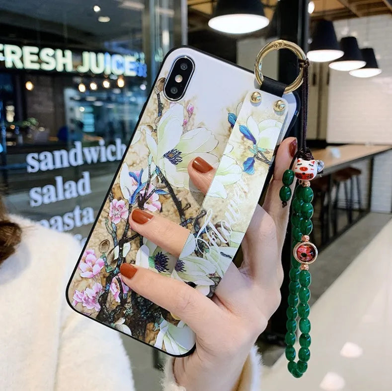 Samsung Galaxy mobile phone case with a built-in flip-out kickstand and strap slot on the back.