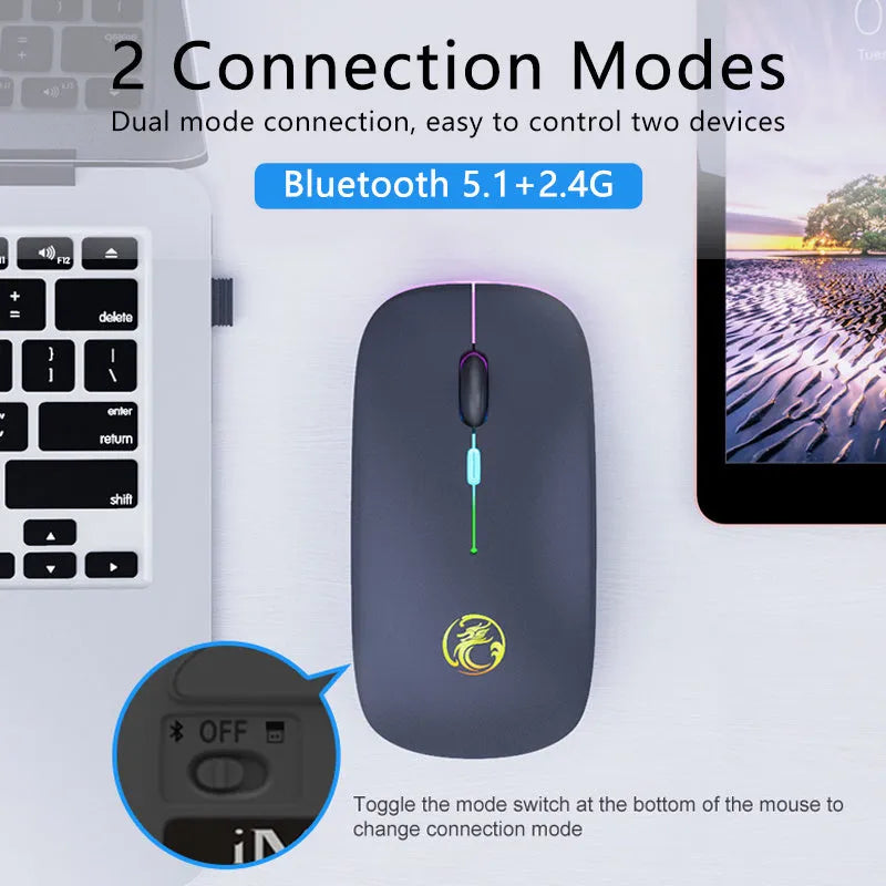 White rechargeable dual-mode silent wireless mouse with blue scroll wheel light on a wooden desk