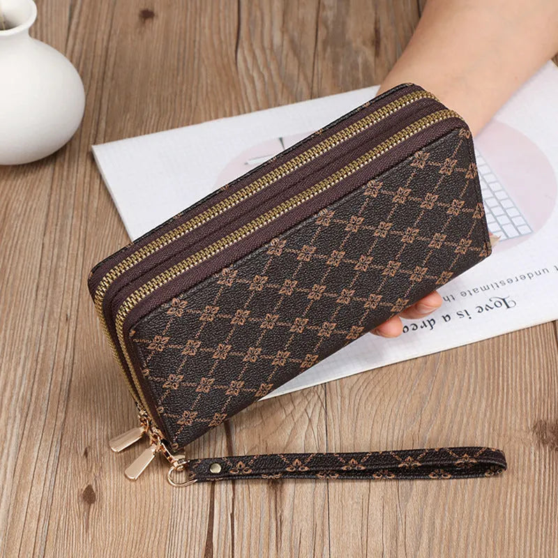 Retro-style long PU leather wallet clutch with printed design showing mobile phone compartment and zipper closure