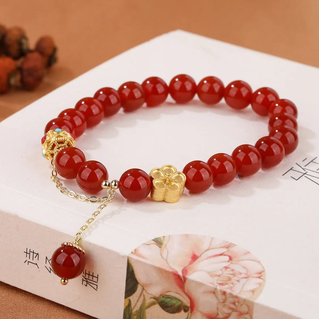 Natural agate bracelet with peach blossom stones and copper components, approximately 8mm bead size