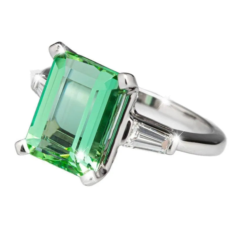 Square green electroplated copper ring on a white surface, geometric design, available in UK ring sizes No 6 to No 10
