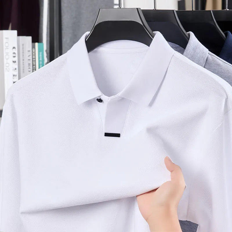 Men's loose-fit cotton polo shirt with asymmetric collar and long sleeves in grey.