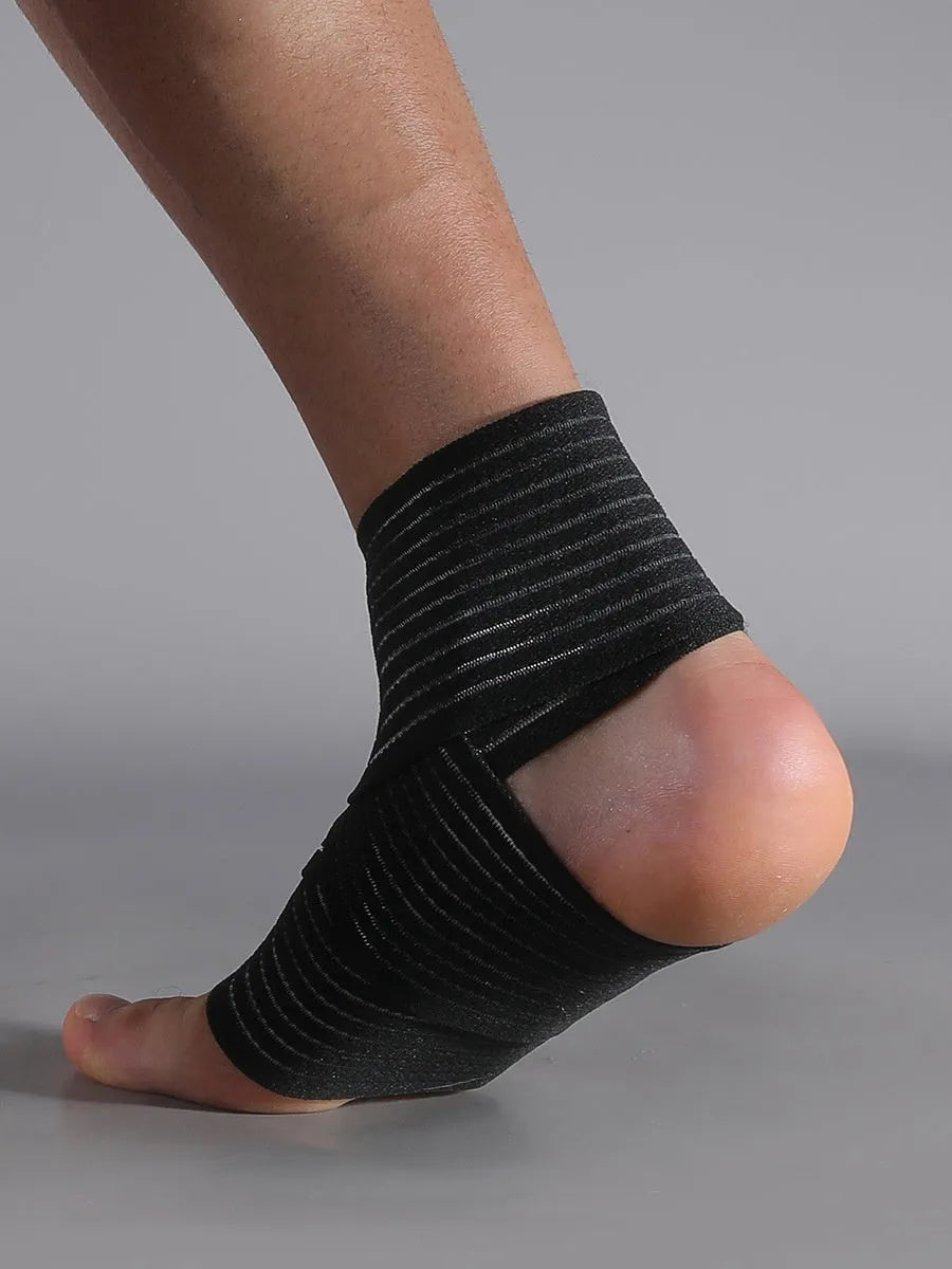 Black adjustable elastic sports bandage for ankle support during running and basketball.