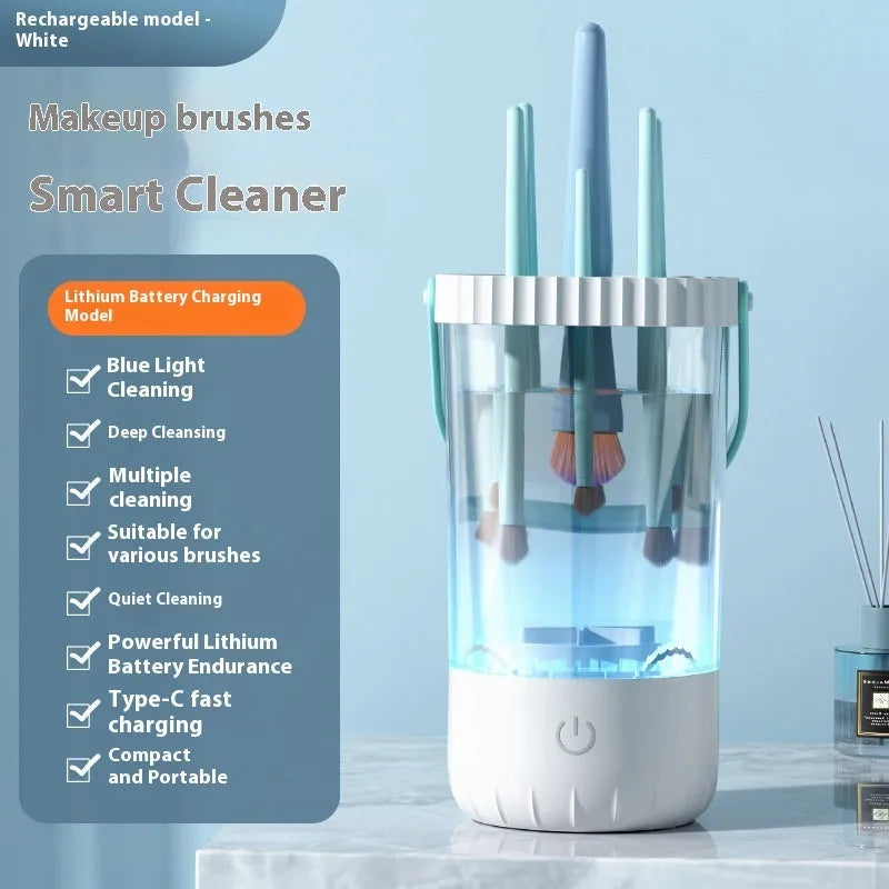 White rechargeable electric makeup brush cleaning device with data cable.