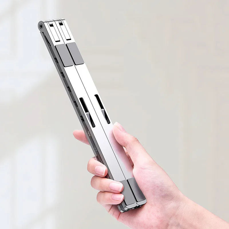 Adjustable foldable aluminium laptop stand with silicone pads for 7-15 inch laptop, silver colour