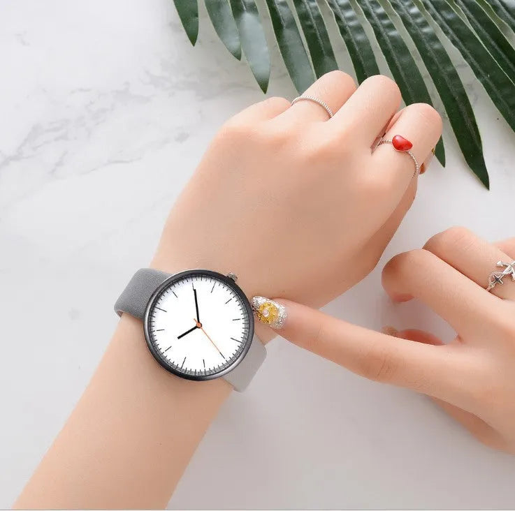 Women's grey contrast PU strap quartz watch with 40mm alloy case, pin buckle, and ordinary glass mirror
