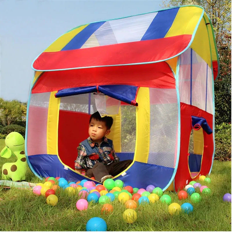 Large blue outdoor children's play tent with roll-up mosquito net curtain in a garden.