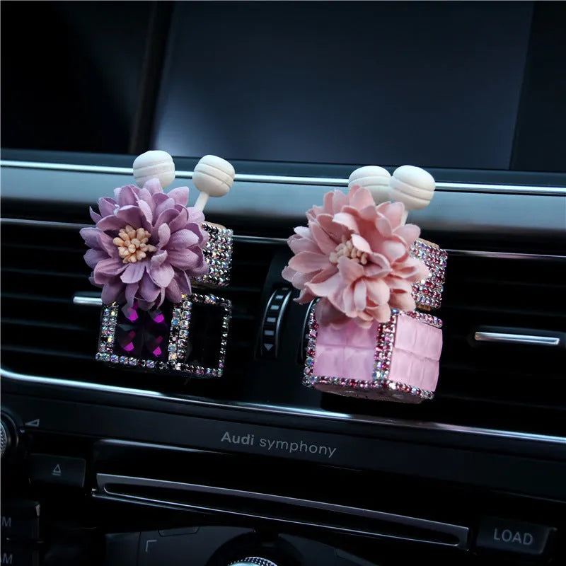 Car flower outlet perfume air freshener in white colour clipped to vehicle air vent, 3.2cm x 7cm size
