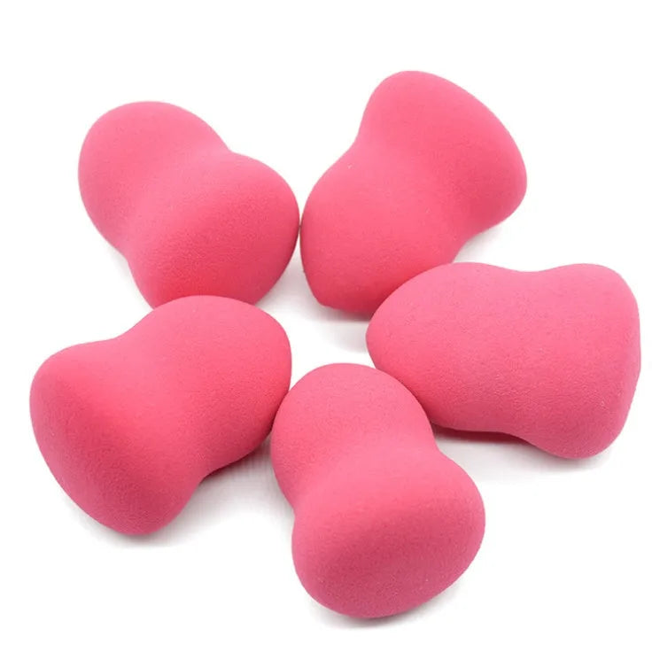 Pink hydrophilic non-latex makeup sponge for foundation application, shown wet and dry